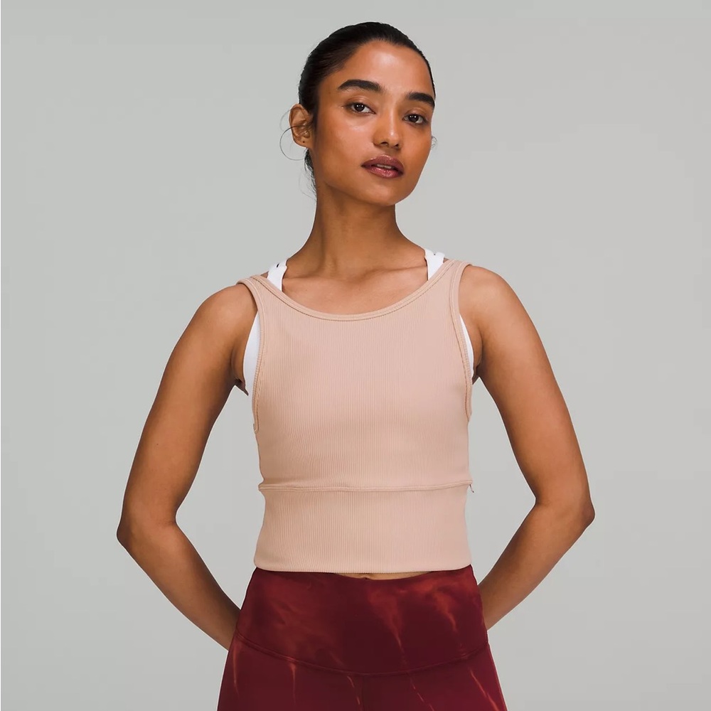 NWT lululemon Power Pivot Ribbed Tank Top. Size 12. Retail $58. Color: Pink clay